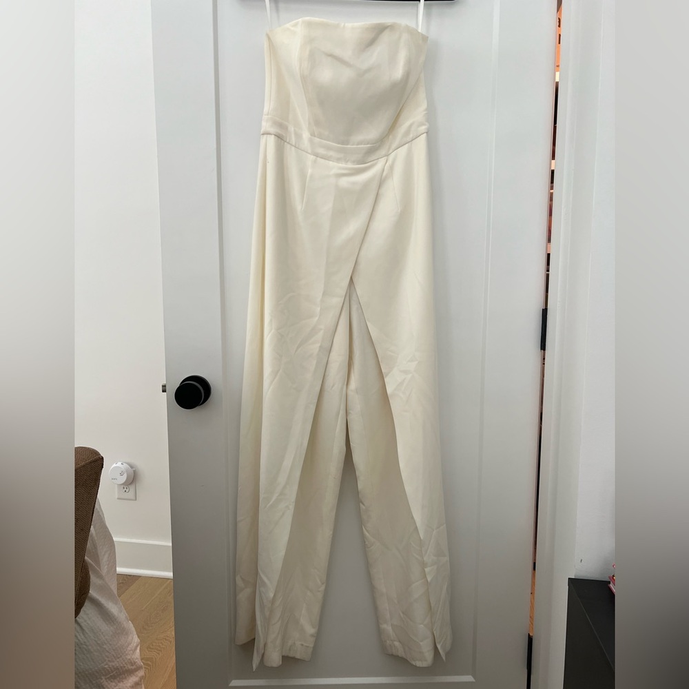 White House, black market cream jumpsuit size 4